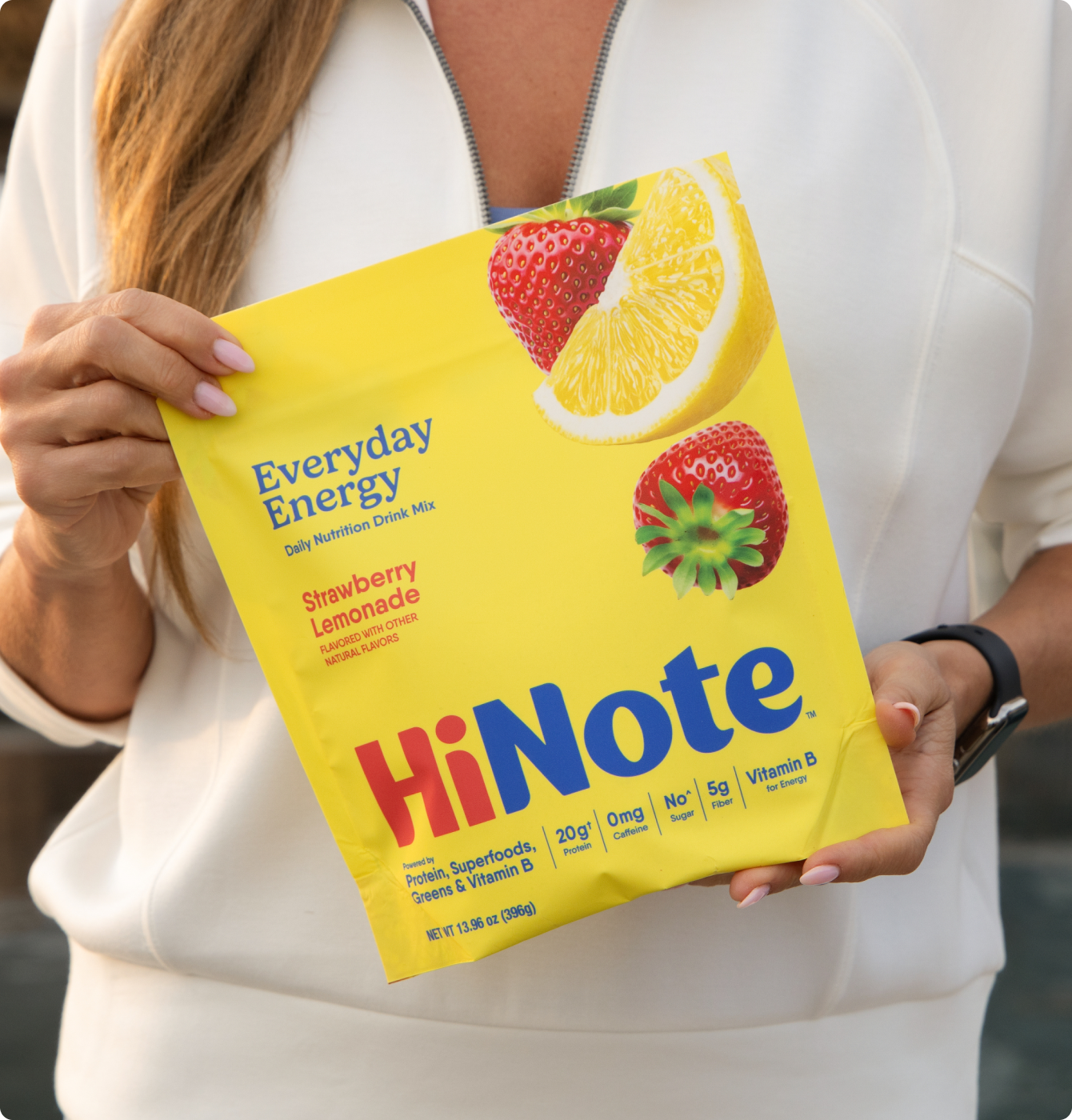 Front of HiNote Everyday Energy pouch (Strawberry Lemonade) showing HiNote logo, fruit images and nutrition callouts