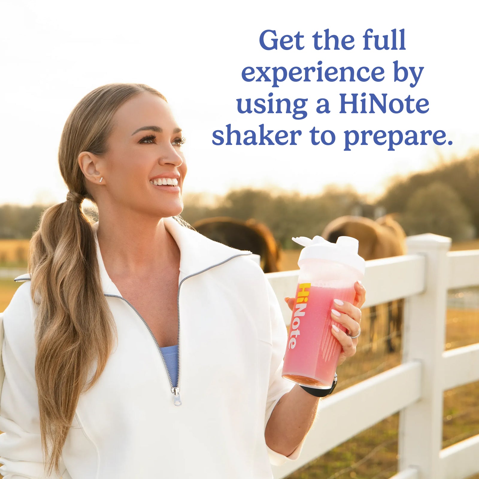 Carrie Underwood holding HiNote shaker outdoors; text: 'Get the full experience by using a HiNote shaker to prepare'